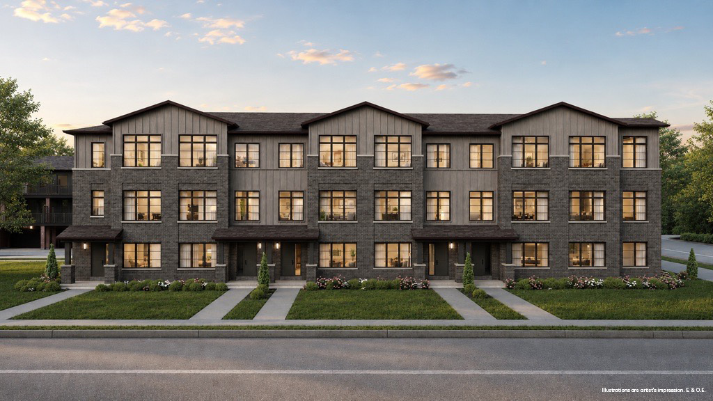 Modern dark-brick townhomes at dusk